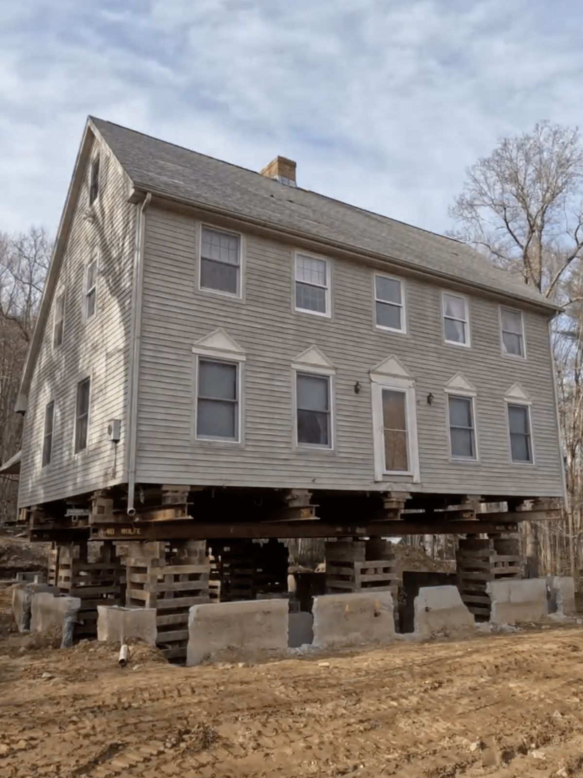 lifted house during foundation replacement. belchertown, ma